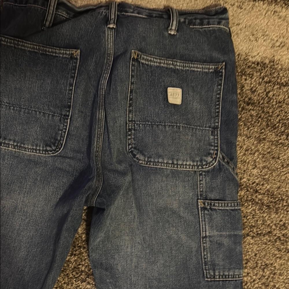 Worn twice American Eagle Outfitters Blue Relaxed Jeans with Distressed Details - Picture 8 of 9